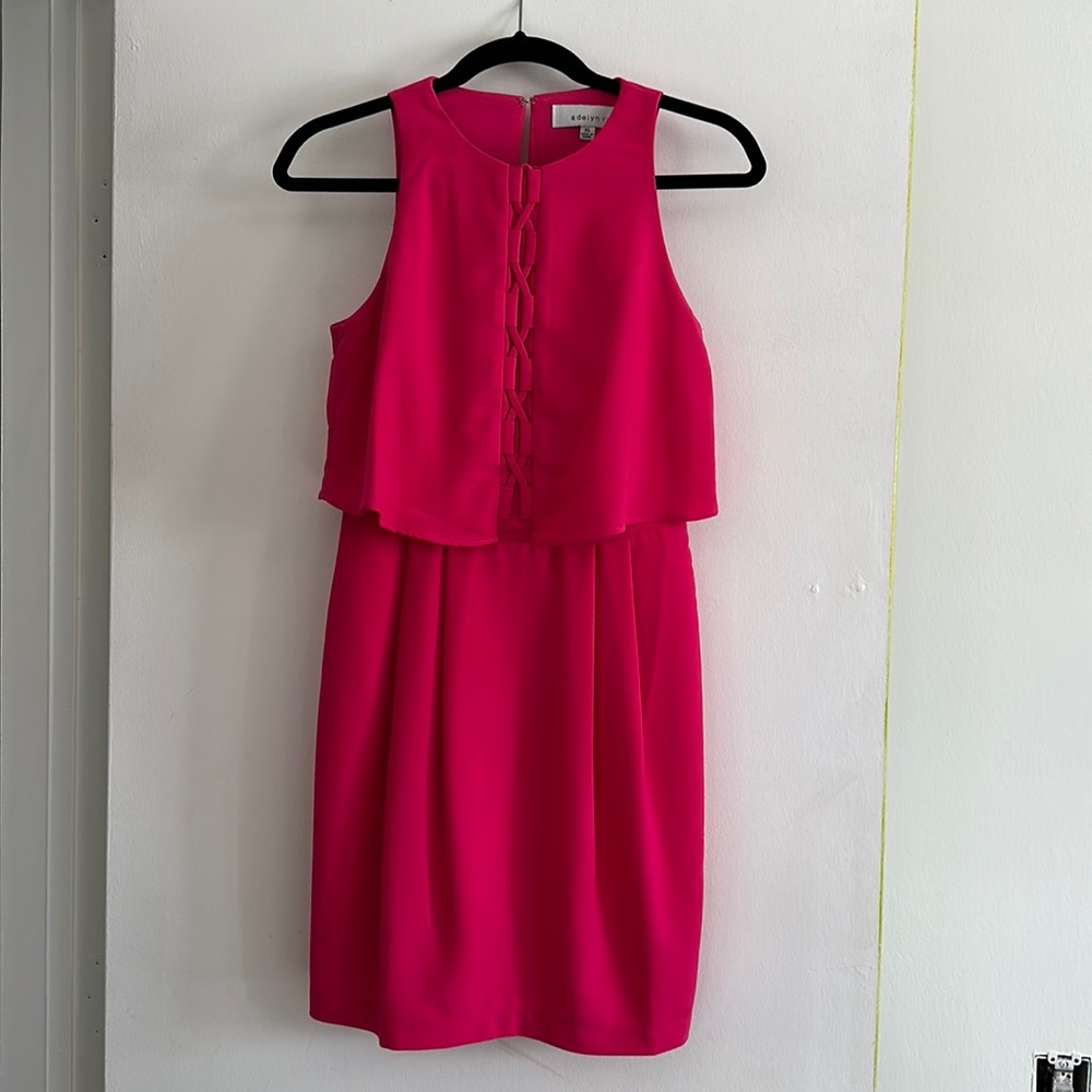 Adorable electric pink dress to wear to any upcoming spring occasion